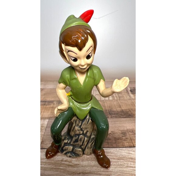 Vintage Disney Japan Peter Pan Ceramic Figurine Hand-Painted Sitting On Tree Stu - Picture 1 of 5